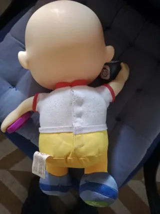 Muñeco Cocomelon con Bloque