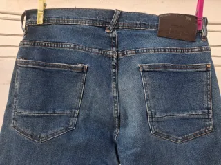 Vaqueros T 44. Medidas en descripción