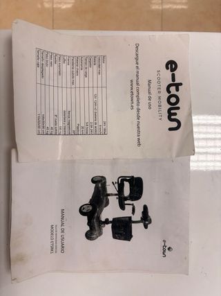 Silla de ruedas eléctrica roja e-town como nueva