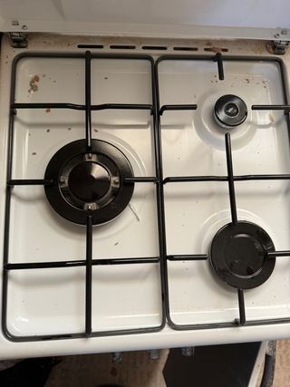 Cocina de gas blanca y negra, como nuevo