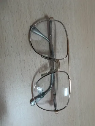 Armação de óculos Lacoste metal dourado/prata