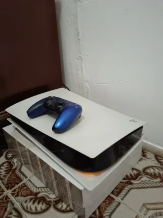 Consola PS5 con mando y cables