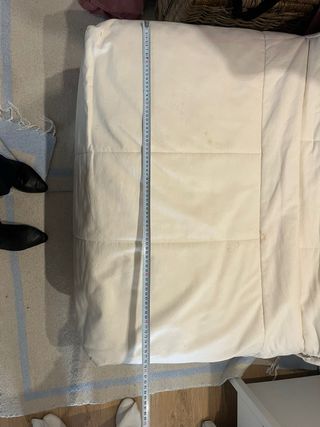 Sofá cama beige con somier de lamas