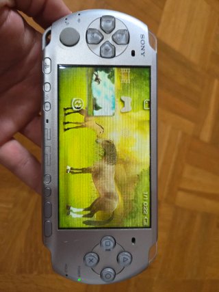 Sony PSP Plata + Accesorios y juegos