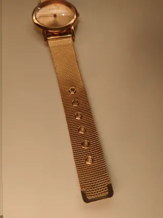 Reloj dorado de malla