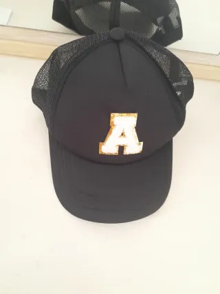 Conjunto riñonera y gorra negra