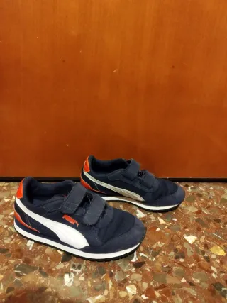 Zapatillas Puma niño azul y naranja