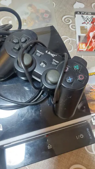 Sony PS3 con 2 Joypad e 6 Giochi