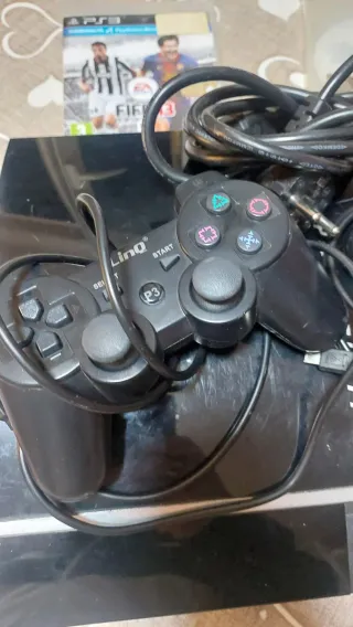 Sony PS3 con 2 Joypad e 6 Giochi
