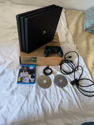 Consola PS4 Pro Negra + Juegos y Accesorios