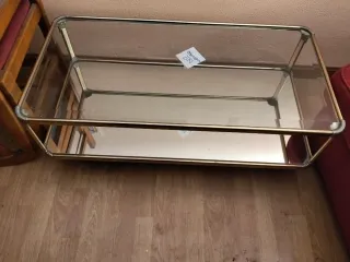 Mesa de centro cristal y metal dorado