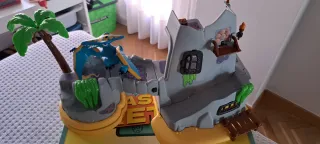 Juguete dinosaurio con castillo