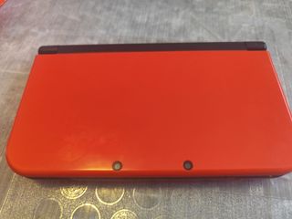 Nintendo 3DS XL Naranja + juegos + lápices