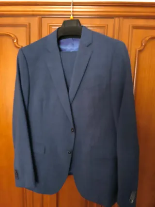 Traje azul/gris T.54 y T.60 (1 puesta)