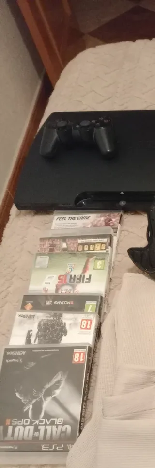 Consola PlayStation 3 Negra + 4 Juegos