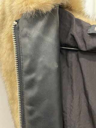 Chaleco de pelo con capucha