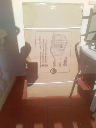 Caseta de madera para perro