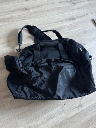 Bolsa técnica con bolsillos laterales