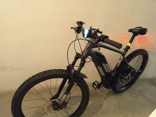 Bicicleta eléctrica Rockrider + casco.