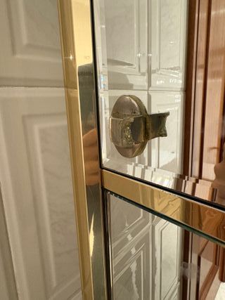 Armario de baño metal dorado espejo