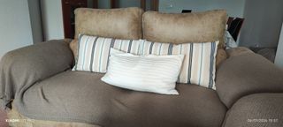 Sofá extensible de tela y piel