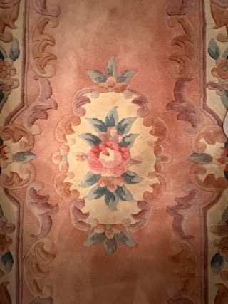 Pareja de alfombras de lana rosa para pie de cama