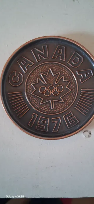 2 Posavasos y abridor 1976 Canadá