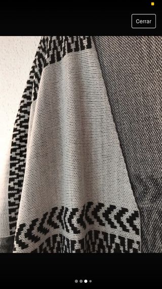 Capa con solapas para mangas.