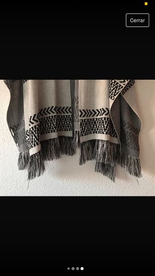 Capa con solapas para mangas.