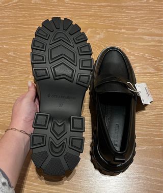 Mocasines Stradivarius negros efecto piel