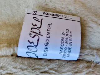 Abrigo de piel auténtico peletería