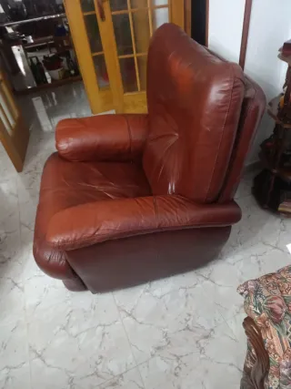Sofá individual reclinable con reposapiés
