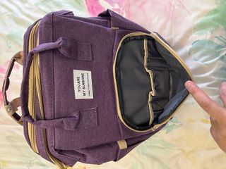 Mochila cambiador bebé morada