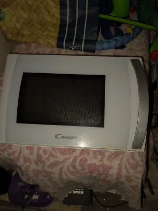 Despiece Microondas Candy CMXG22DW