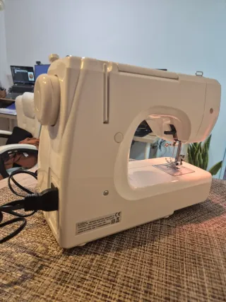 Máquina de coser Lazer