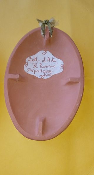 Coppia terrecotte da parete decorate a mano