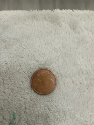 Moneta 5 cent. con difetto