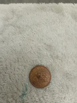 Moneta 5 cent. con difetto