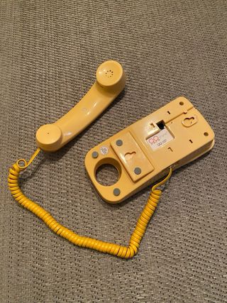 Teléfono fijo decorativo naranja