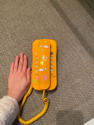Teléfono fijo decorativo naranja