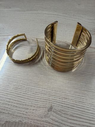 Pulseras de acero doradas