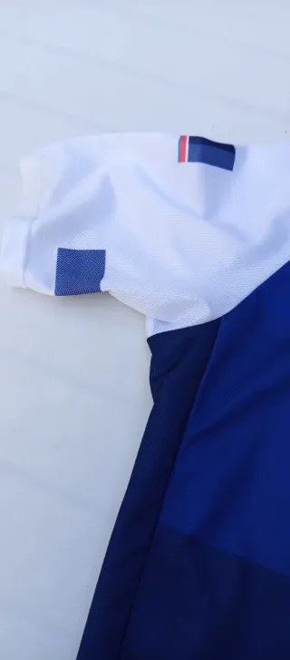 Maillot ciclista azul y blanco