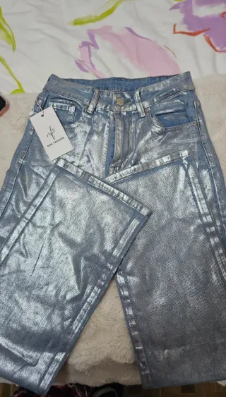 Chaqueta y vaquero plateada M/ queda a S