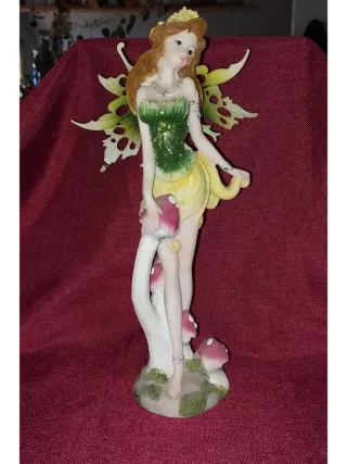 Statua fata resina abito verde e funghi