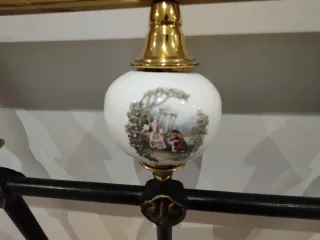 Cabecero forja y latón con porcelana 135