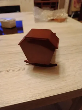 Cuna mecedora casa muñecas