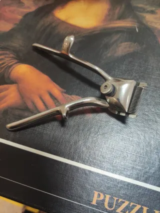 Máquina de cortar pelo antigua