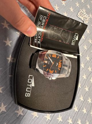 Reloj Lotus Plata y Naranja