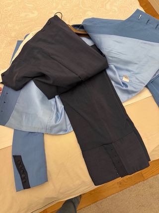 Traje de corto hombre azul y negro