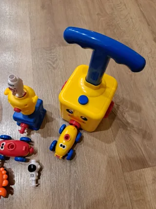 Juego coche infla globos